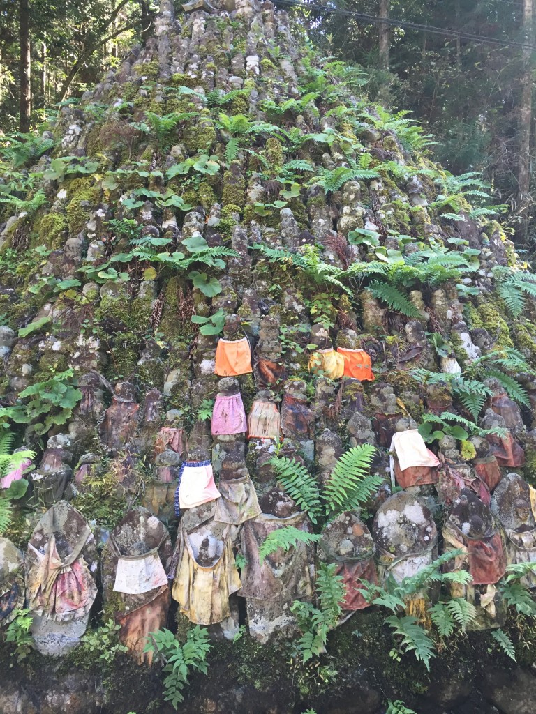 A large mountain of Jizo statues near the lantern storehouse